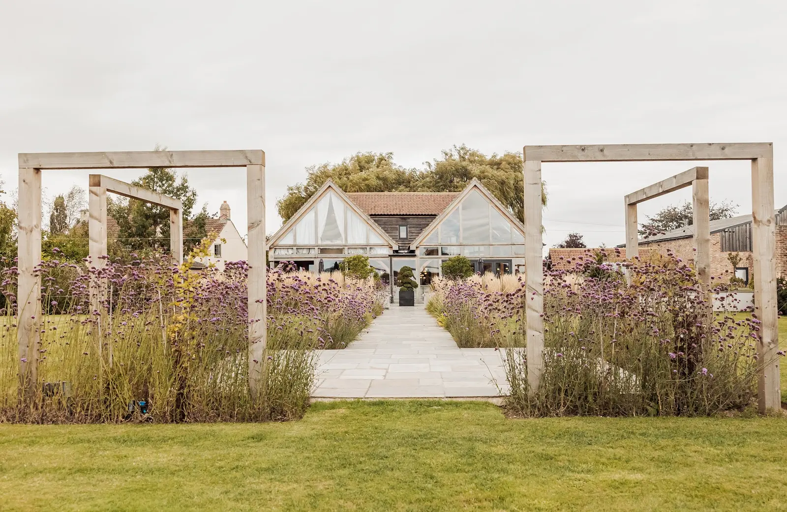 Timber frames over the lavender walk, looking towards the house